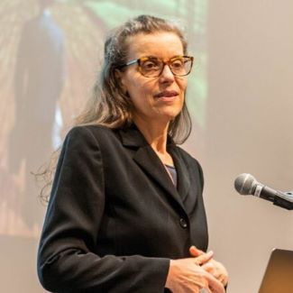 Dr. Twiss speaking at an event