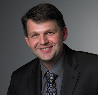 A headshot of Benedikt Hallgrimsson