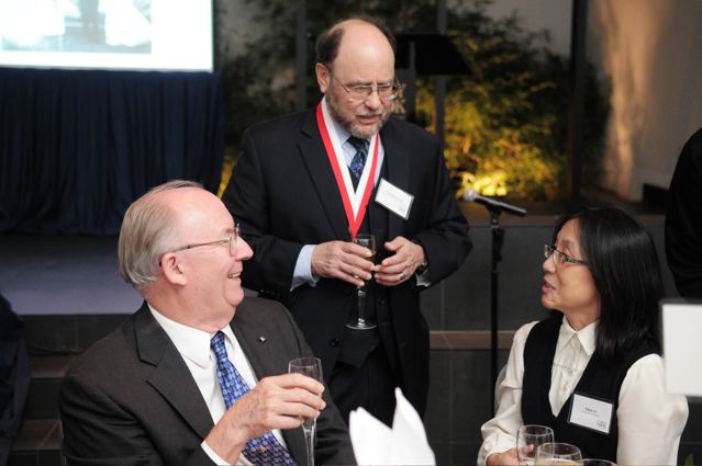 Rohlf, Bookstein, and Ellen Li conversing at the reception