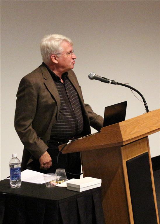 Walt Eanes welcoming the audience to Dr. O'Higgins' Rohlf Medal lecture