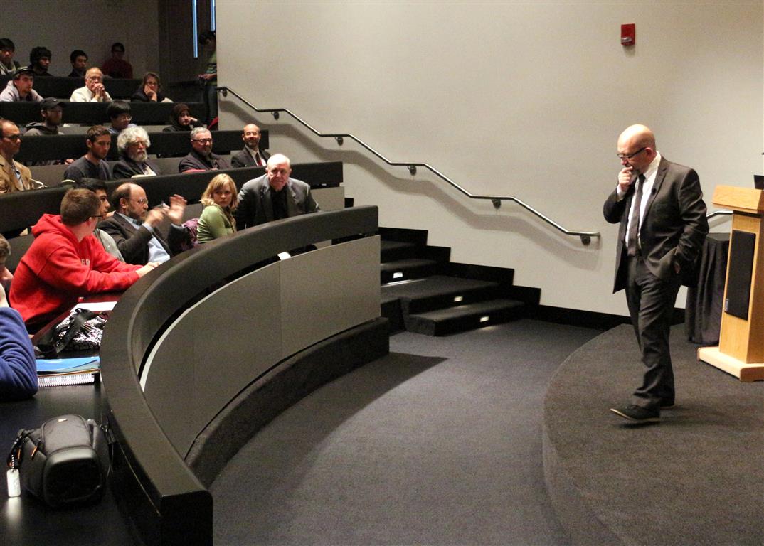 Paul O'Higgins considering his answer to a question posed by the audience