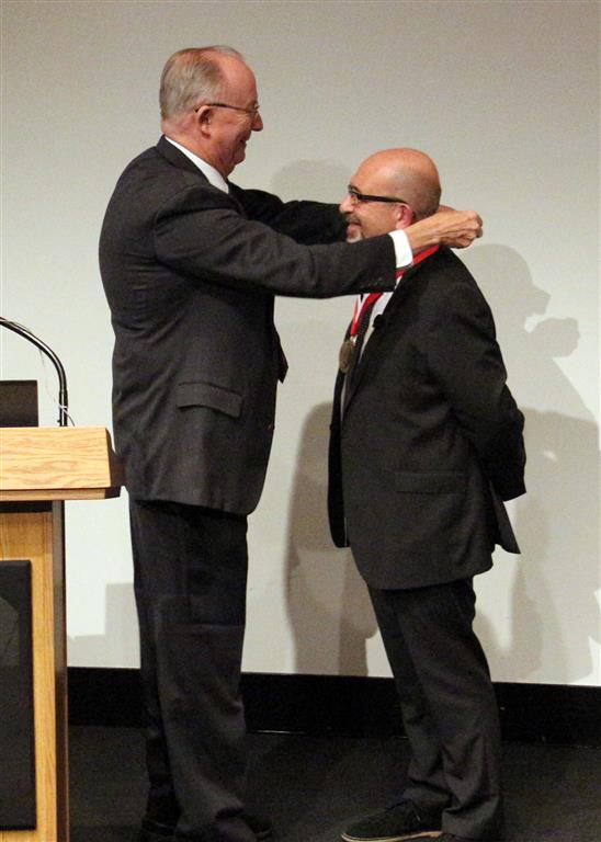 F. James Rohlf presents the Rohlf Medal to Paul O'Higgins