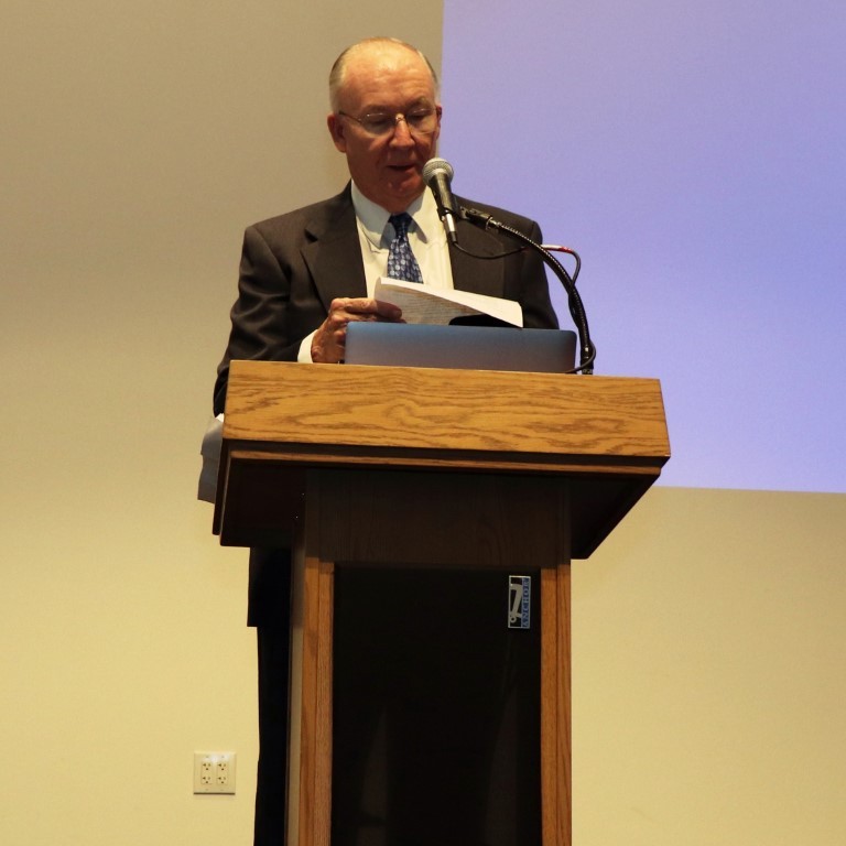 F. James Rohlf at the podium explaining why Dennis Slice was selected for the Rohlf Medal