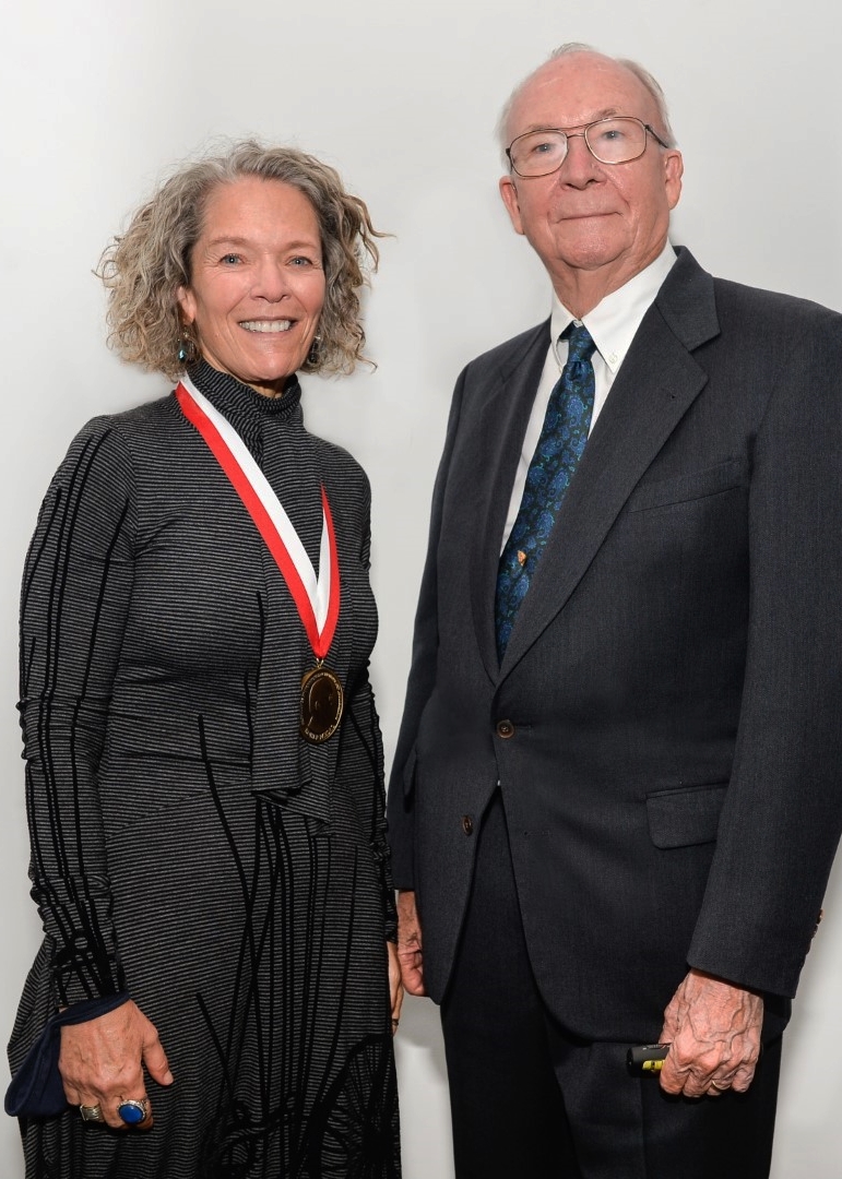 Joan T. Richtsmeier wearing her medal and standing next to F. James Rohlf