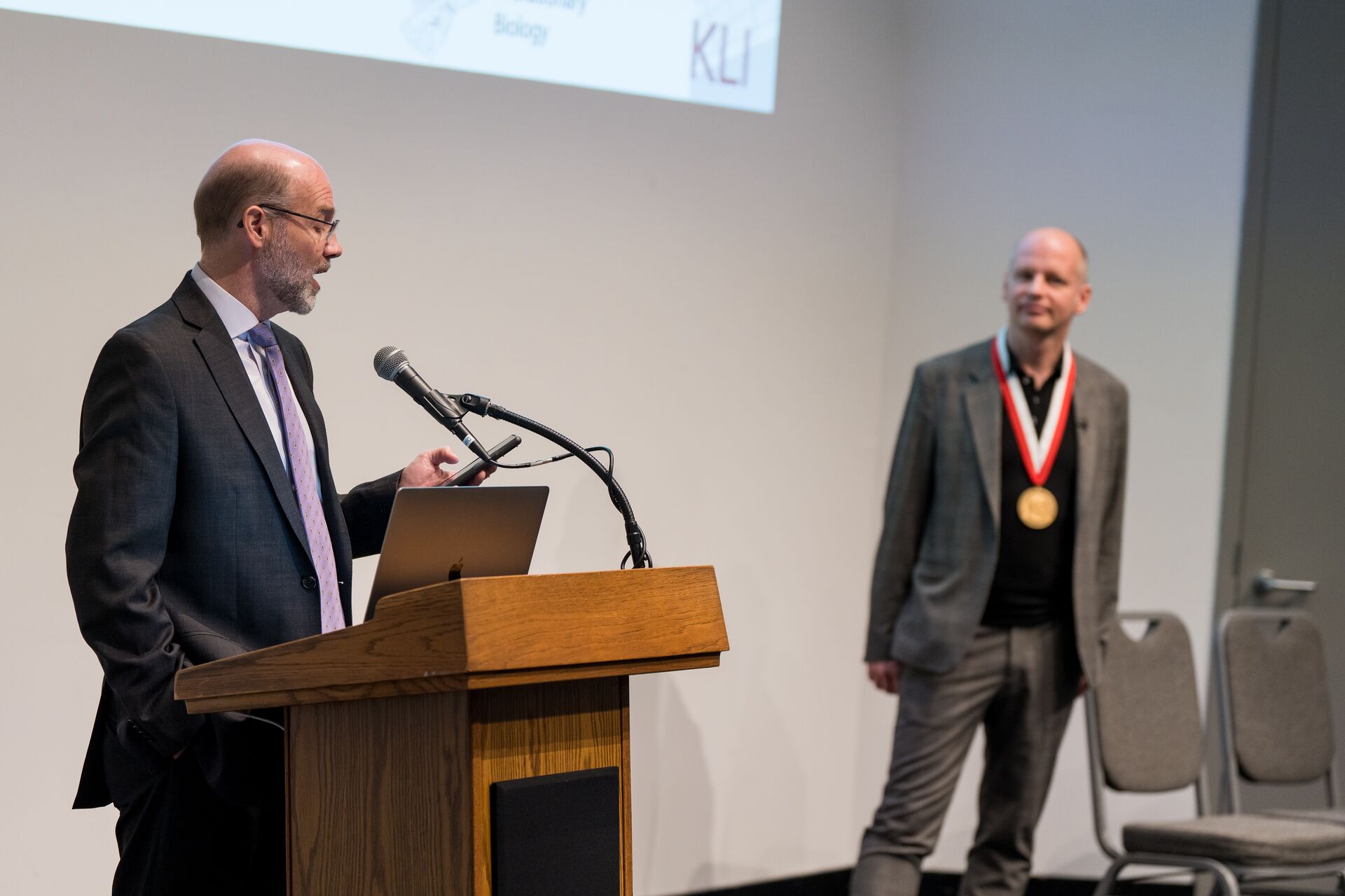 Dean Adams at the podium introducing Philipp Mitteroecker and his Rohlf Medal lecture
