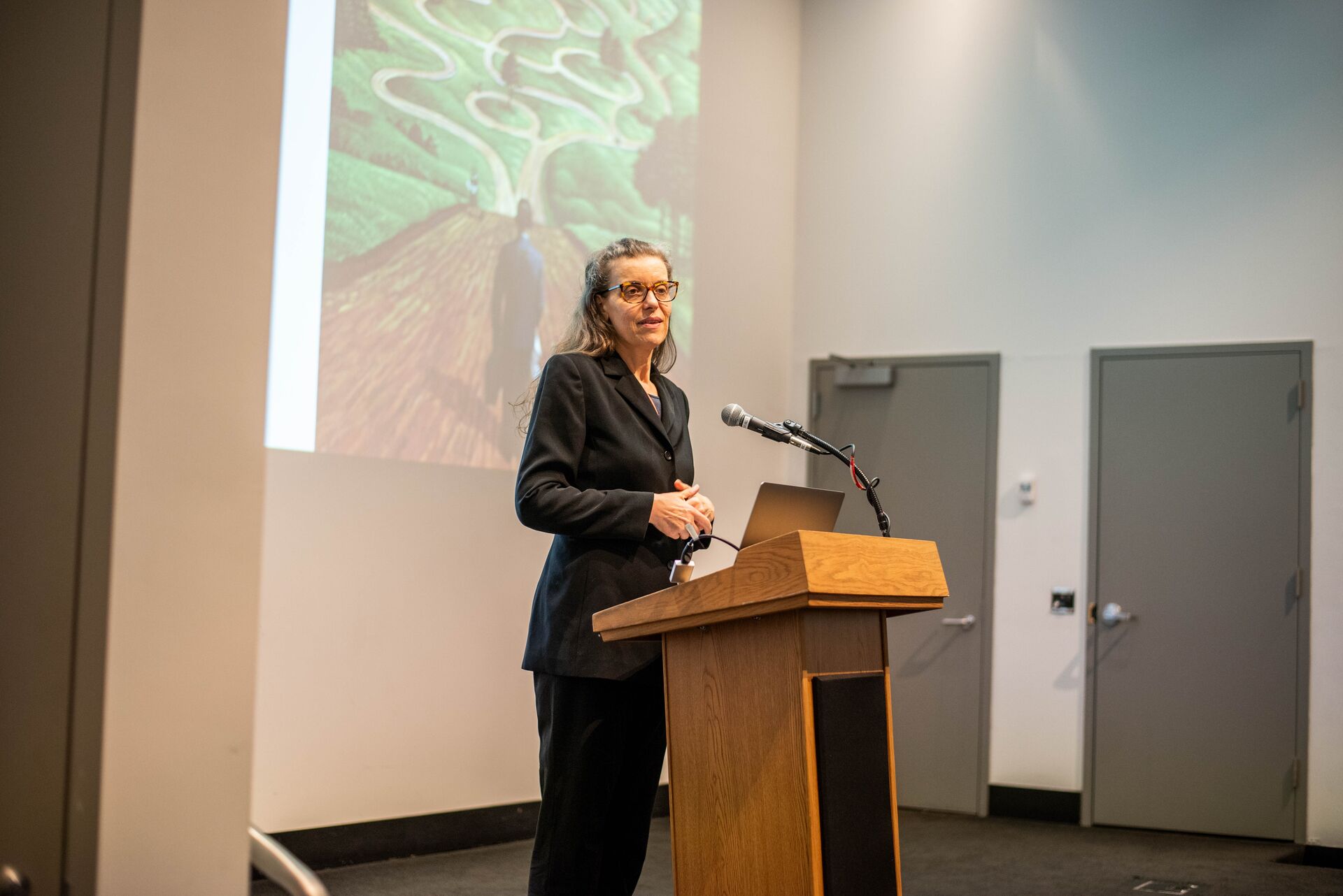 Department Chair Kathy Twiss at the podium introducing the Rohlf Medal lecture