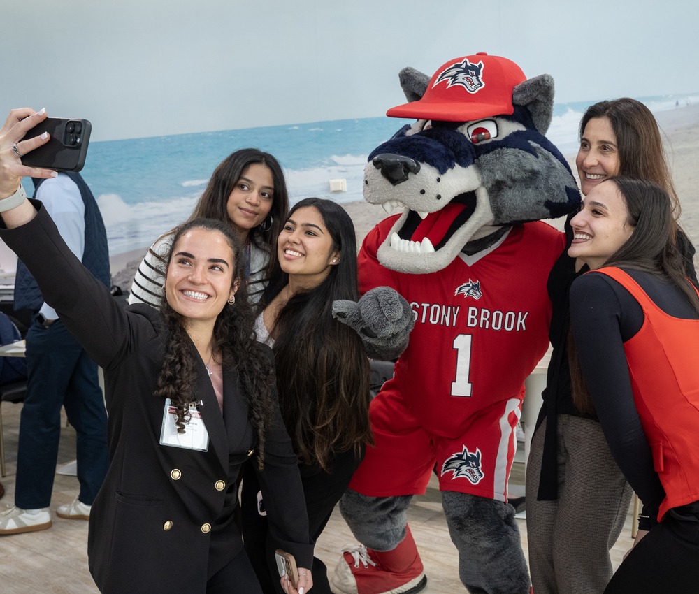 students taking selfie with Wolfie
