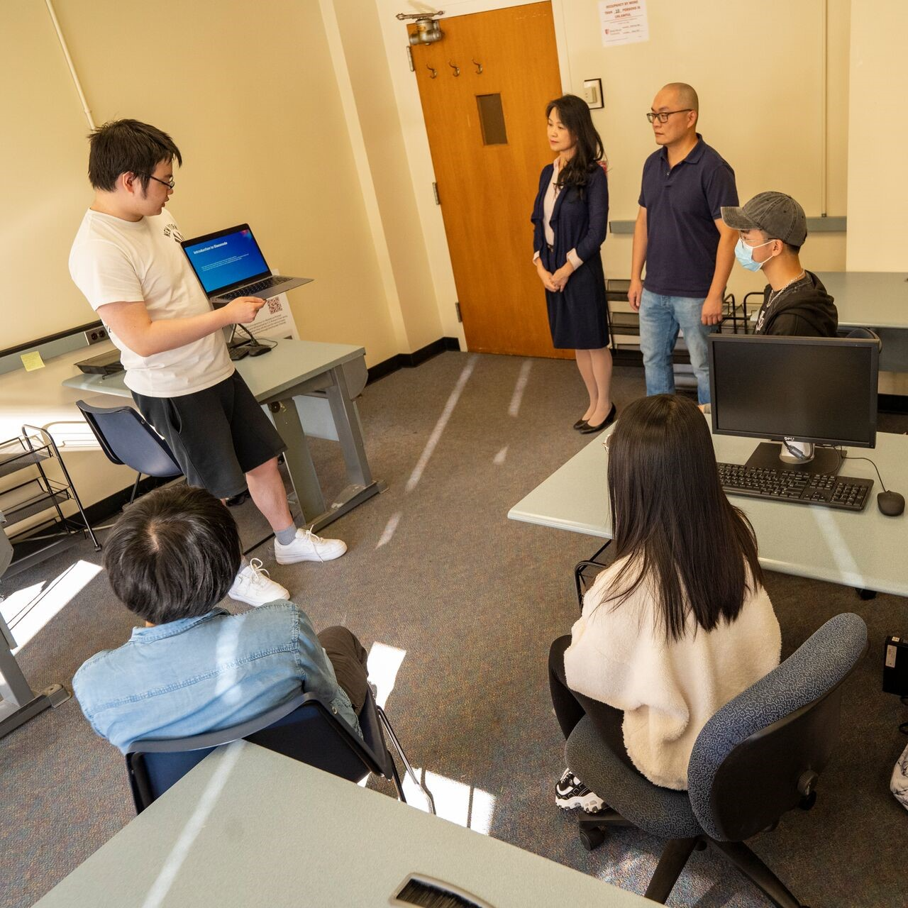 student giving presentation in class