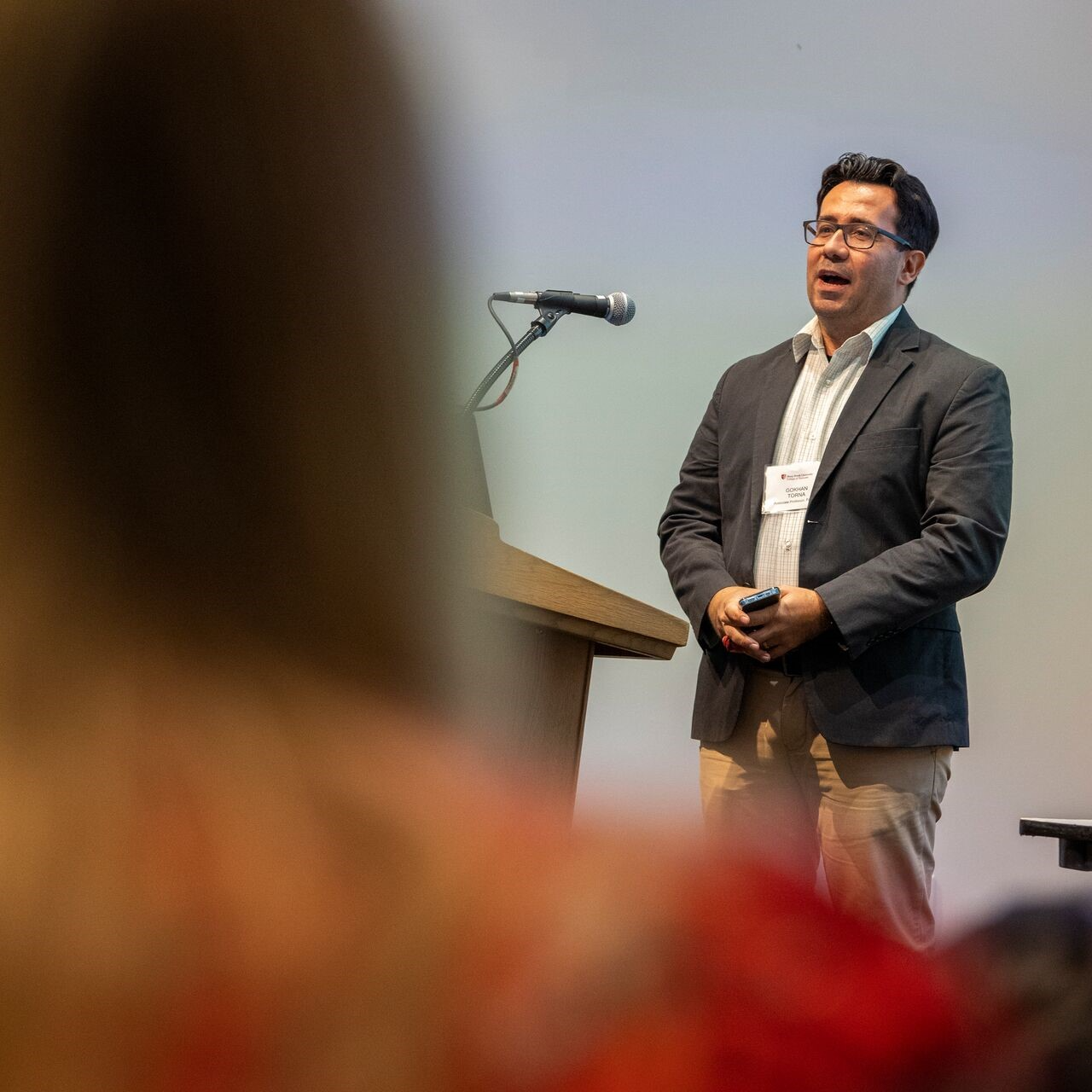 professor Gokhan Torna giving lecture