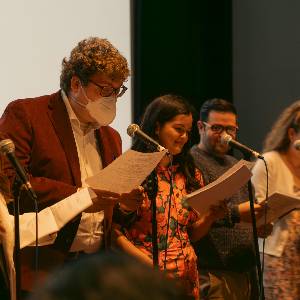 Screenwriters read out the scripts they've written into microphones