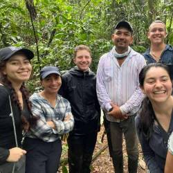 Six PhD students in the woods
