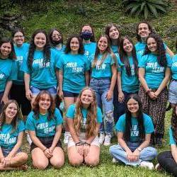 Group of undergraduates at a study abroad location with a PhD student