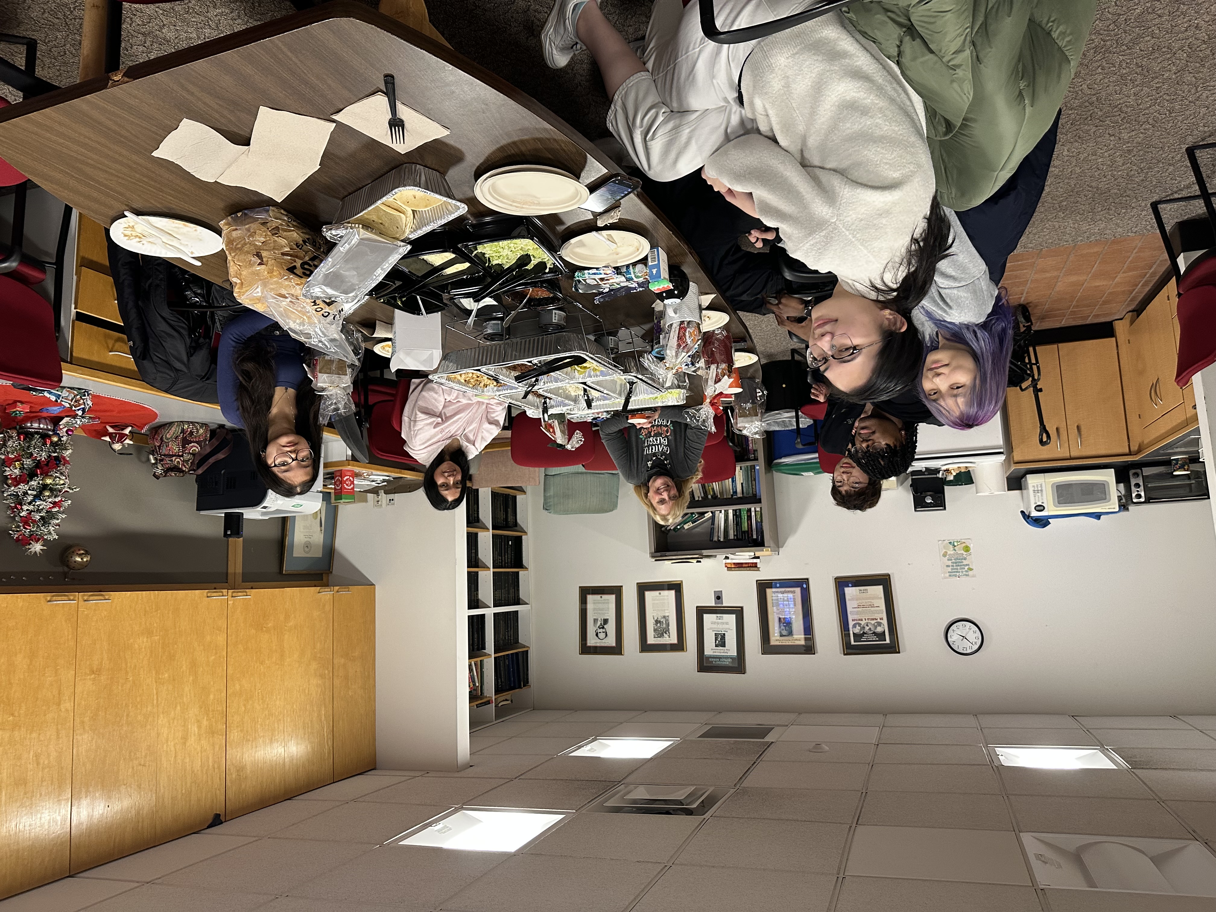 End of semester celebration picture around the table