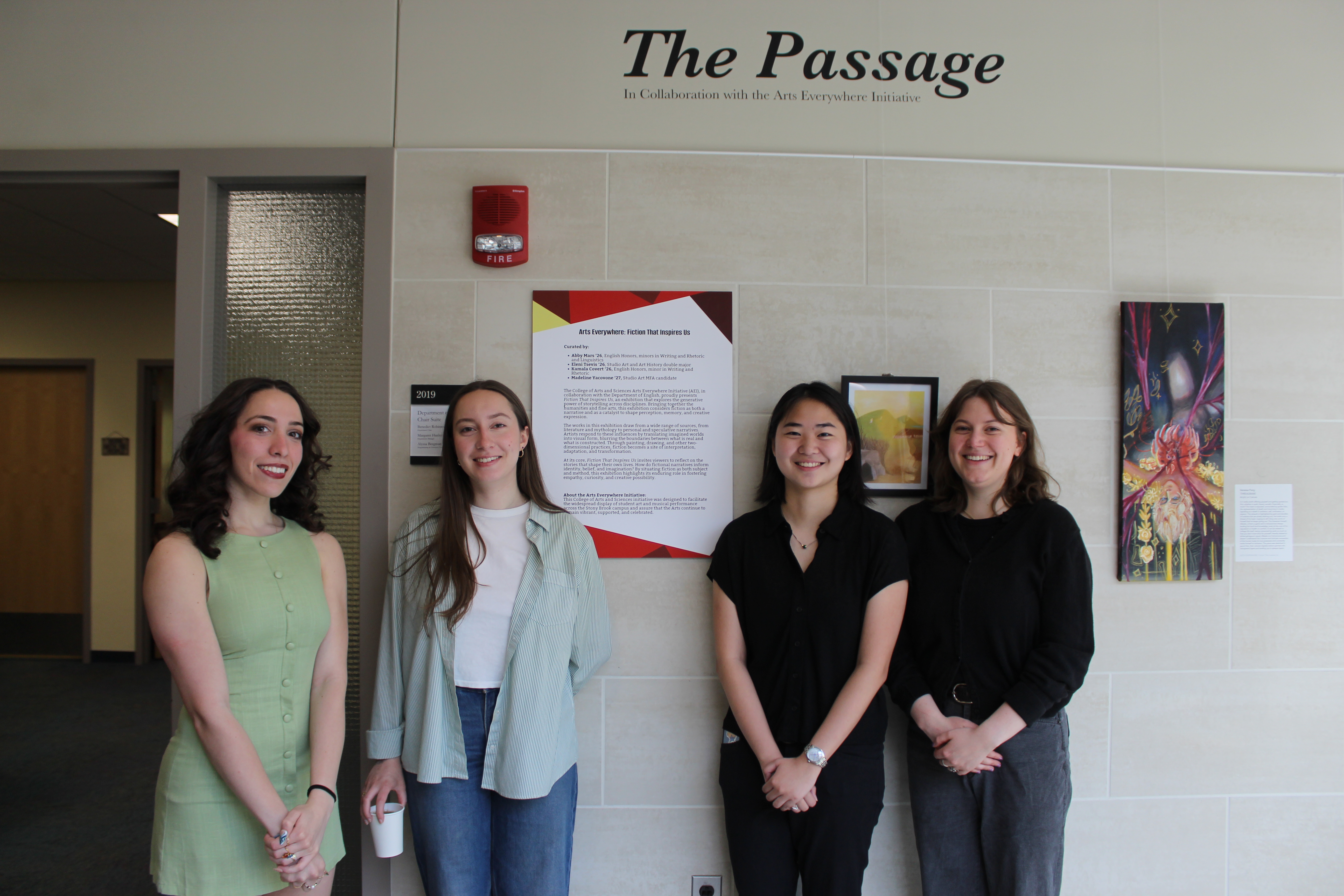 From Left to Right: Eleni Tsevis '26, Madeline Yacovone '27, Abby Mars '26 and Kamala Covert '26 in front of the opening of "The Passage"