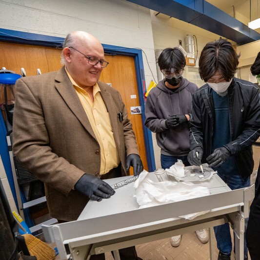Gary Halada working in lab