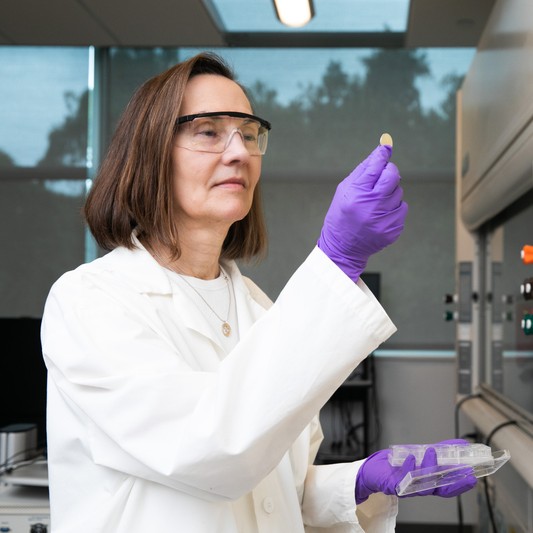 Esther Takeuchi working in lab