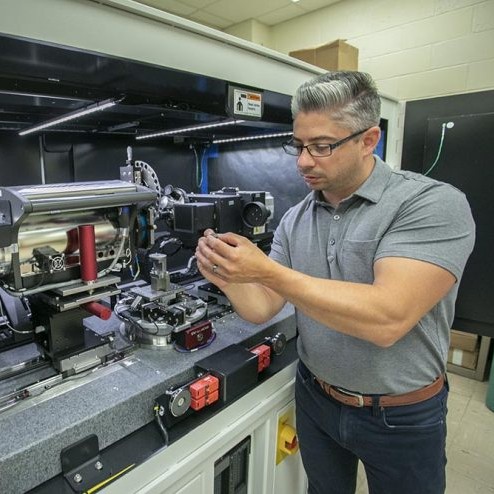 Jason Trelewicz working in lab
