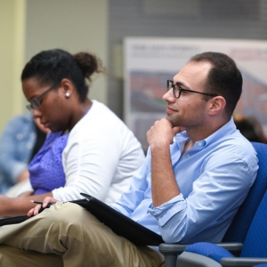 Man and woman in lecture hall