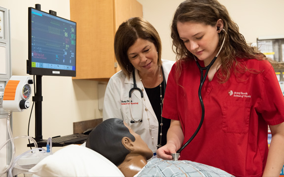 Student in medical setting practicing