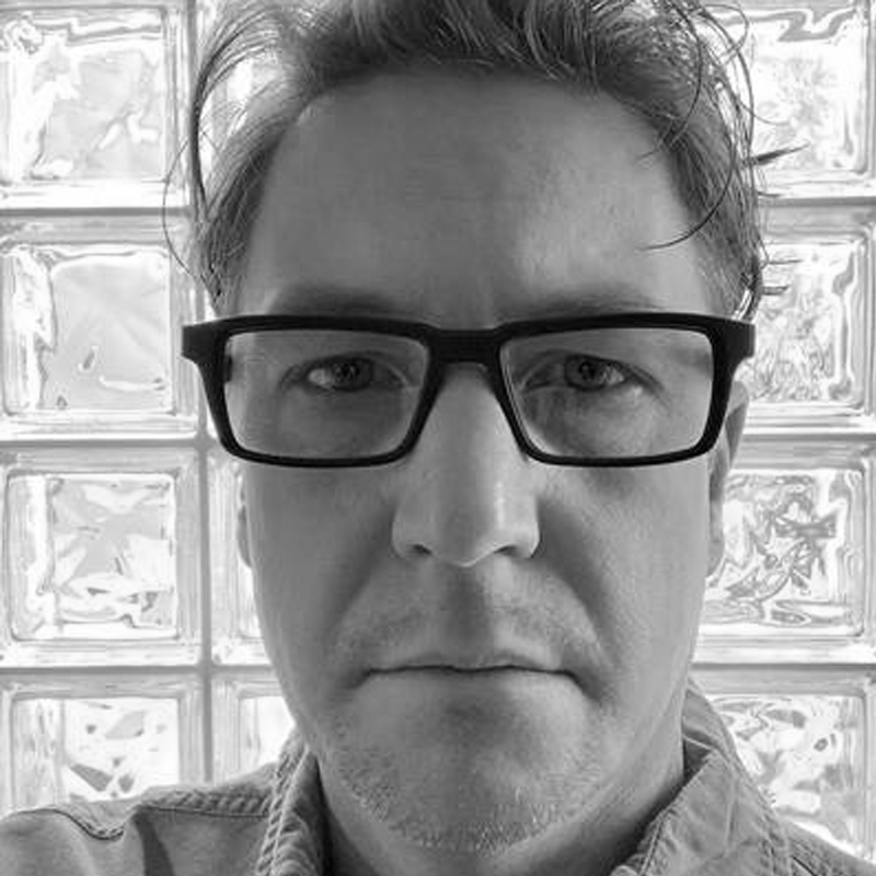head shot of Jason Paradis