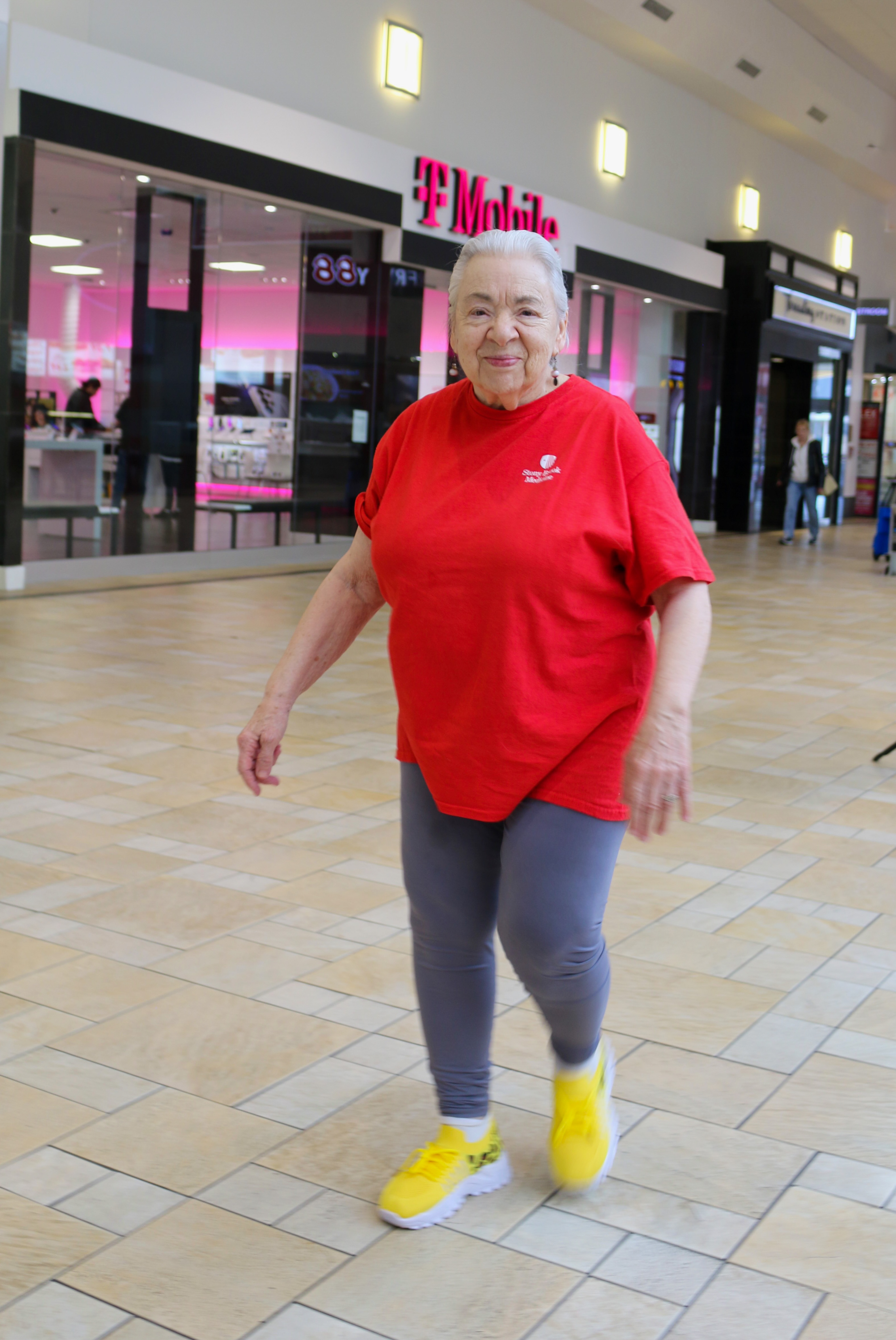 A member of the Mall Walkers Club walks in the mall.