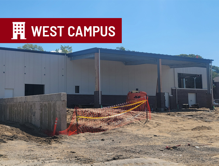 image showing construction site with exterior of buiding constructed and "west campus" location overlay