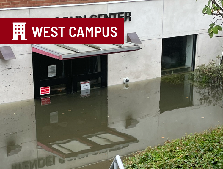 Flood waters four feet high in front of Mendelsohn Center dorm with "west campus" location overlay