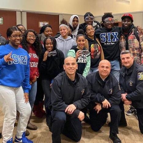 Students participating in a safety class taught by campus police officers