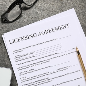 Licensing agreement document on desk
