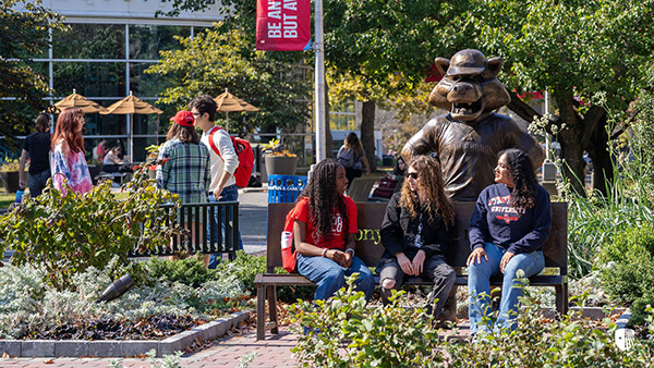 Students sitting on a bench