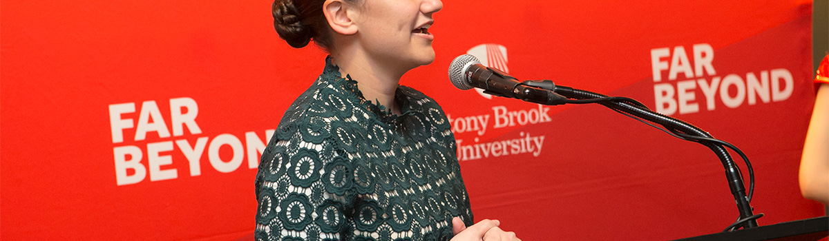 Special Event Woman Speaking at Microphone