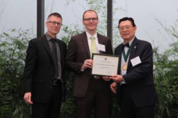 Iwao Ojima and Peter Donnelly with Young Academic Inventor Award recipient