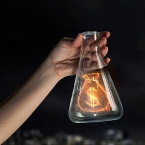 Bag of money inside a chemistry flask