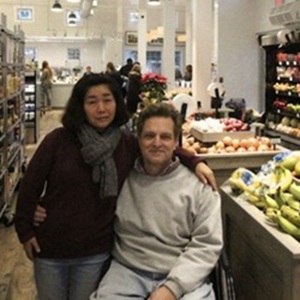 Damark's Market Owners in produce aisle