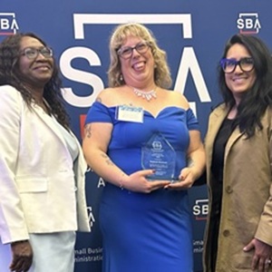 Gifty and Ree with client at SBA award ceremony