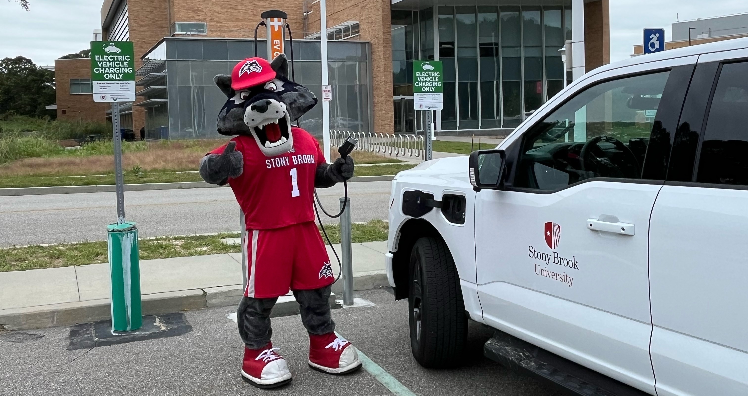 Wolfie charging a Ford Lightning Truck