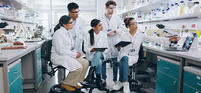 Individuals working in a science lab