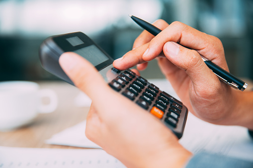 Person using calculator