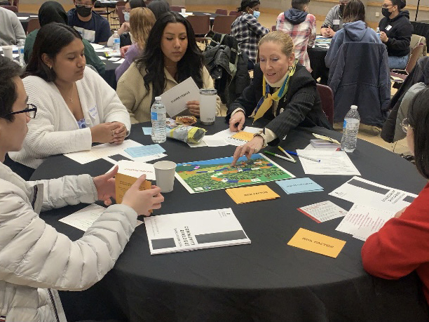 Students participating in a roundtable activity.