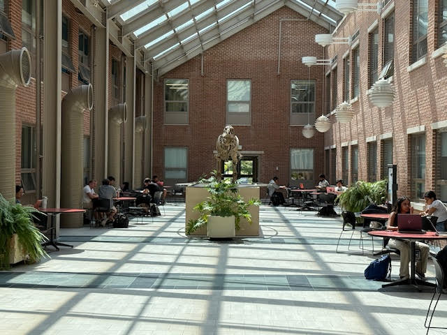 Humanities atrium with dinosaur skeleton