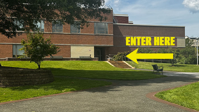 Closer view of the Humanities with the Enter Here and an arrow pointing at the door.