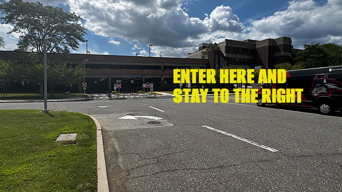 Exterior view of SBU administration garage: "Stay to the Right"