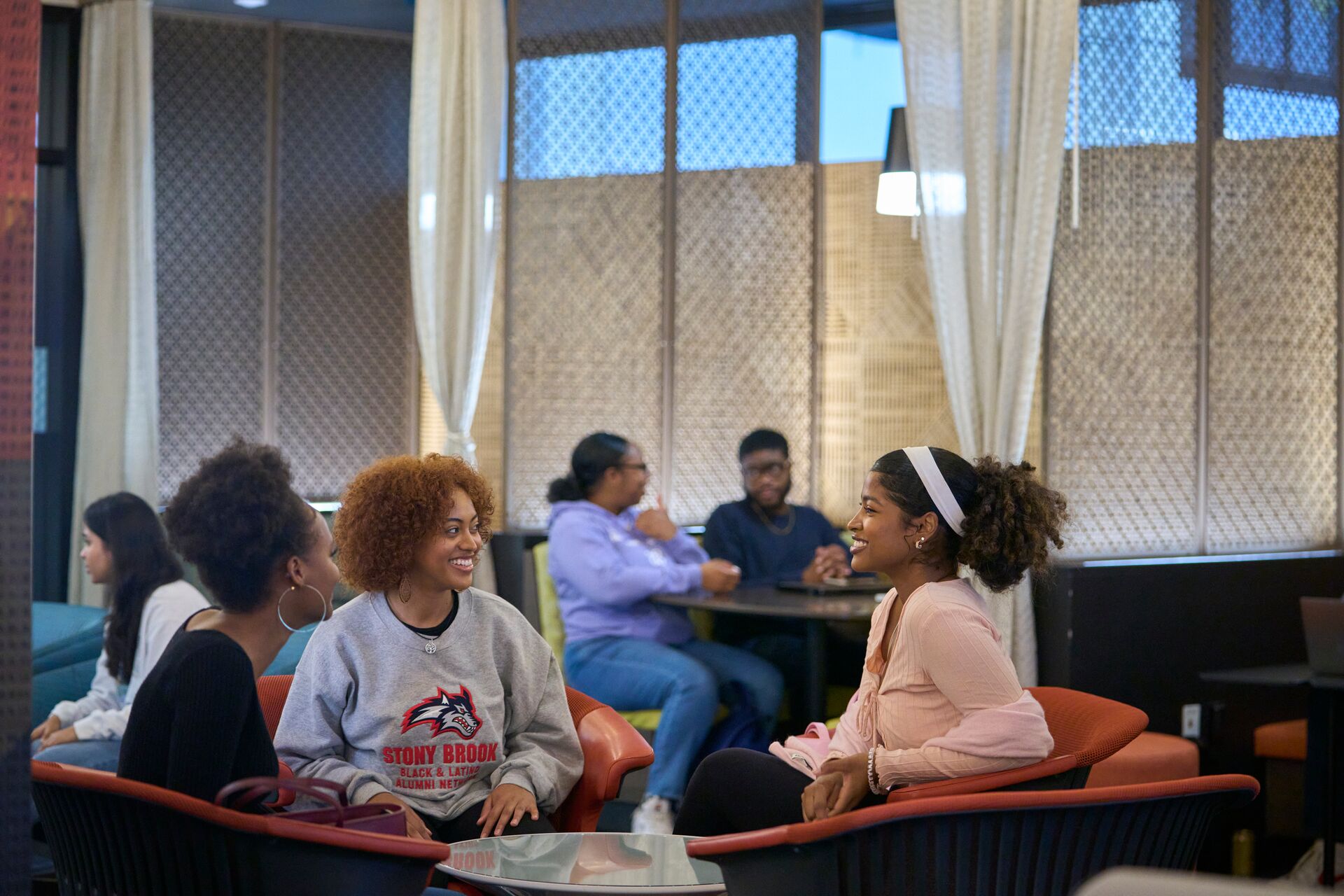 students sitting together in a lounge space