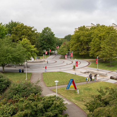 Aerial view of campus plaza with walkways and trees representing a virtual campus tour