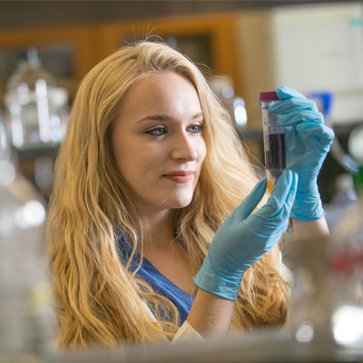 Student researcher working in a science laboratory