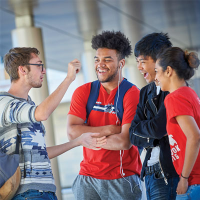 a group of laughing students
