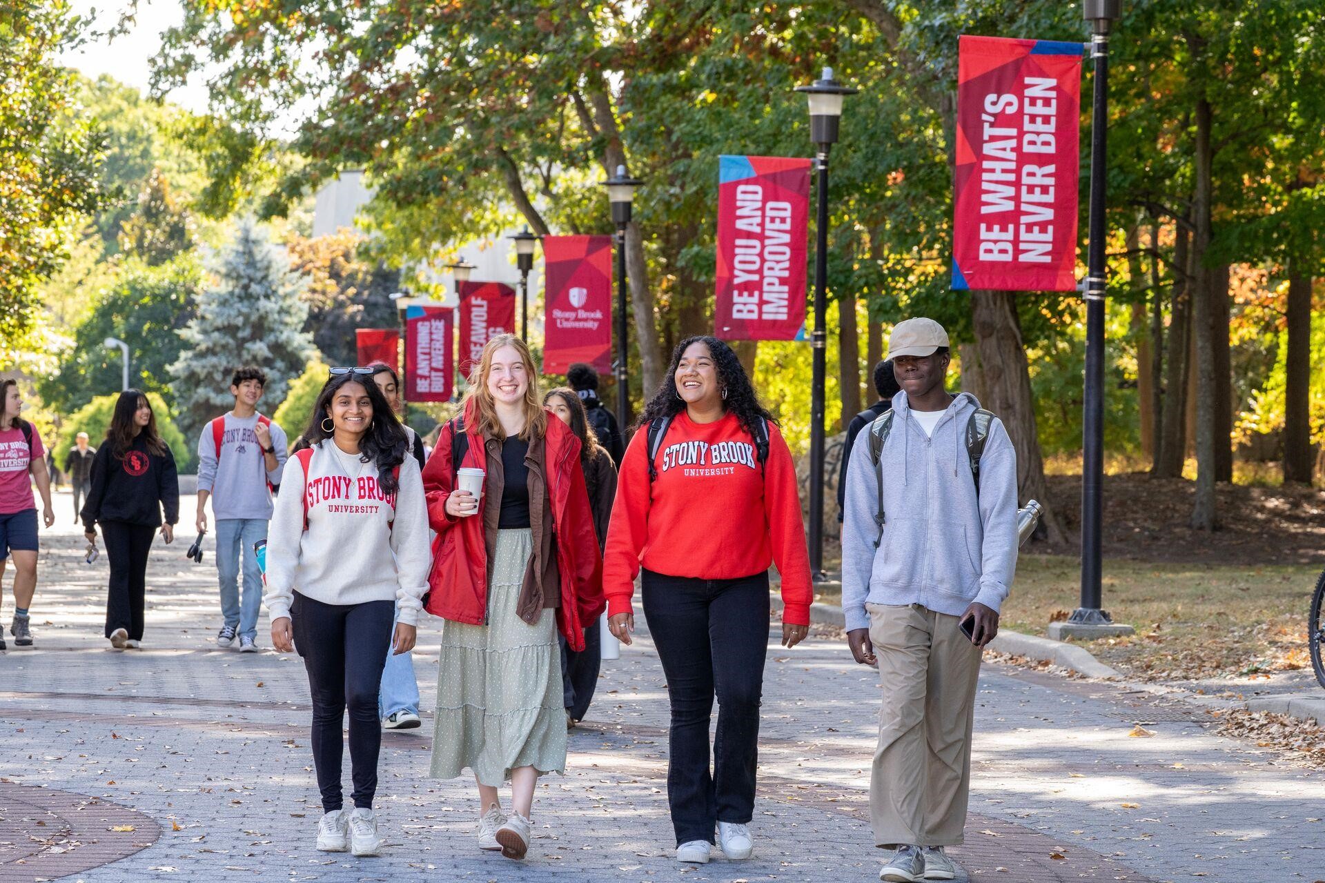 Diverse Students walking on Stony Brook University campus