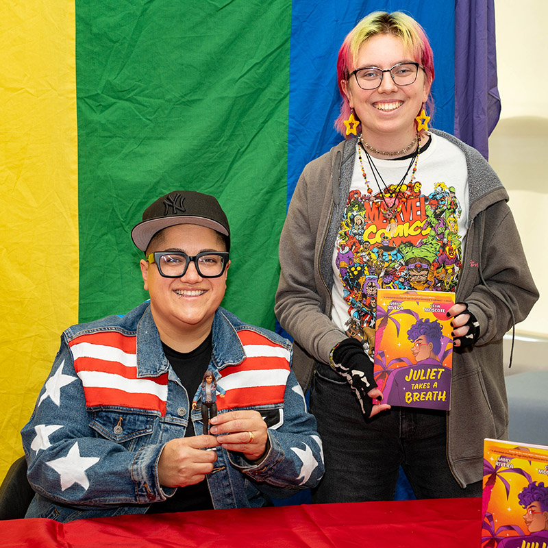 Marvel Comics writer Gabby Rivera and an SBU student