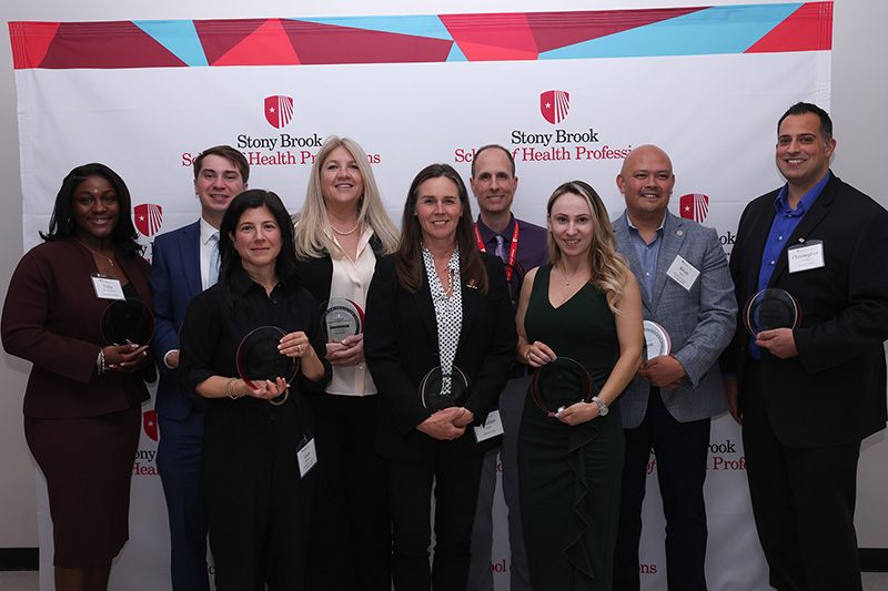 Group photo of outstanding alumni award recipients