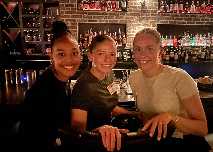 Three gold members at restaurant